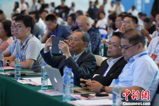 研討會現(xiàn)場圖?！■暮陚?攝